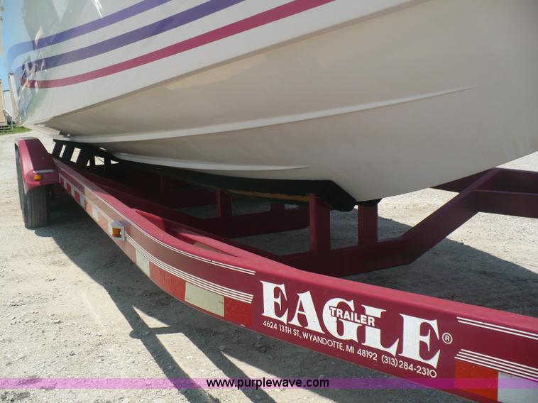 image for item A4851 1995 Baja 320 OS 32' boat and trailer