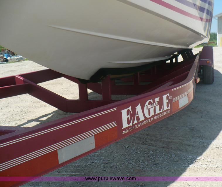 image for item A4851 1995 Baja 320 OS 32' boat and trailer