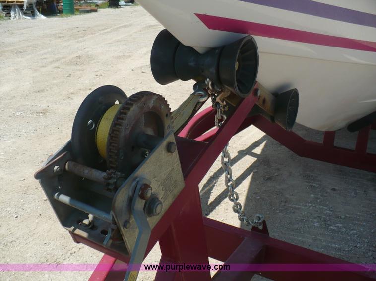 image for item A4851 1995 Baja 320 OS 32' boat and trailer