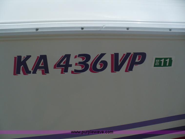 image for item A4851 1995 Baja 320 OS 32' boat and trailer