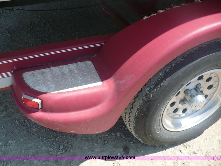 image for item A4851 1995 Baja 320 OS 32' boat and trailer