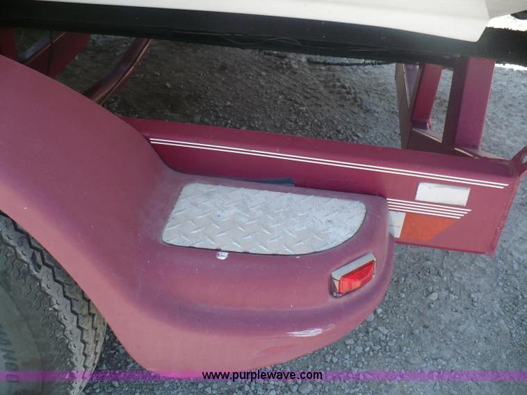 image for item A4851 1995 Baja 320 OS 32' boat and trailer