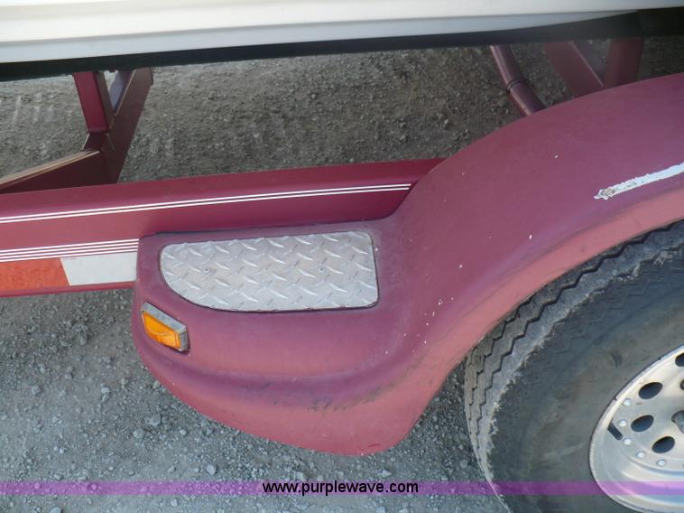 image for item A4851 1995 Baja 320 OS 32' boat and trailer