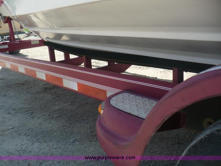 image for item A4851 1995 Baja 320 OS 32' boat and trailer