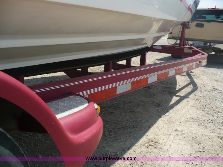 image for item A4851 1995 Baja 320 OS 32' boat and trailer