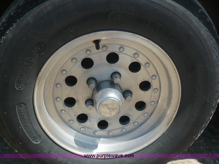 image for item A4851 1995 Baja 320 OS 32' boat and trailer