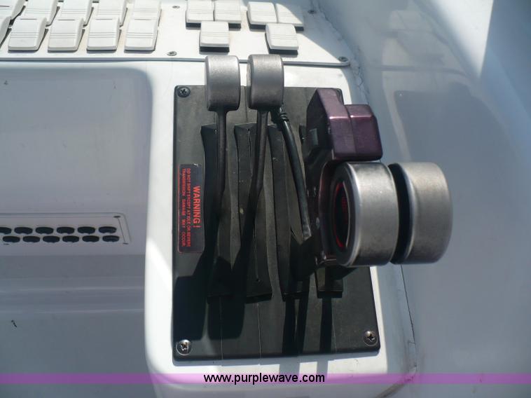 image for item A4851 1995 Baja 320 OS 32' boat and trailer