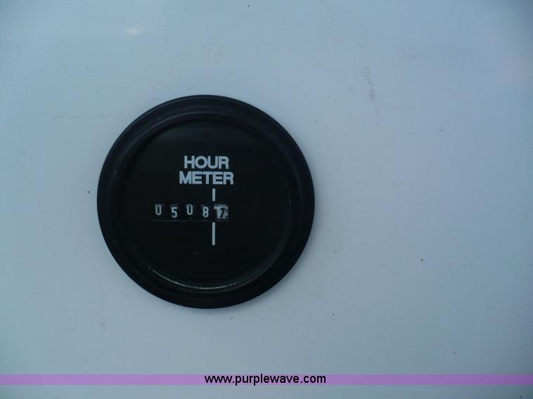 image for item A4851 1995 Baja 320 OS 32' boat and trailer