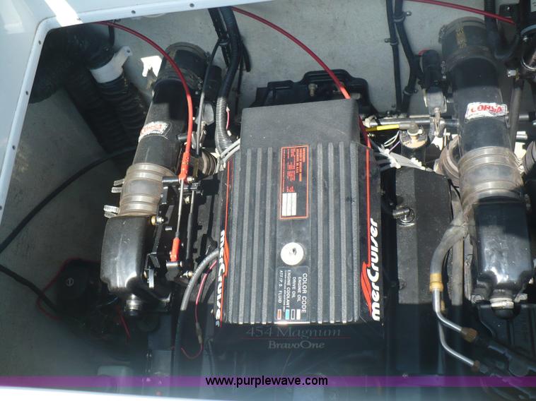 image for item A4851 1995 Baja 320 OS 32' boat and trailer