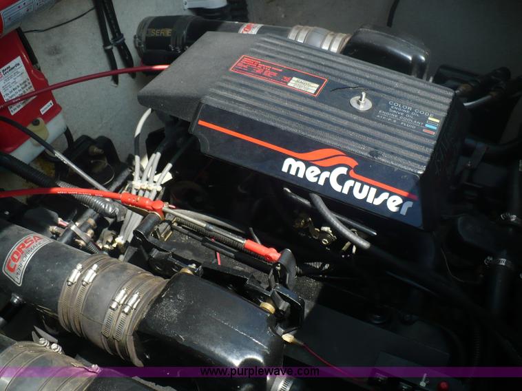 image for item A4851 1995 Baja 320 OS 32' boat and trailer