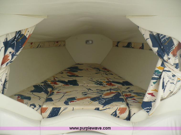 image for item A4851 1995 Baja 320 OS 32' boat and trailer