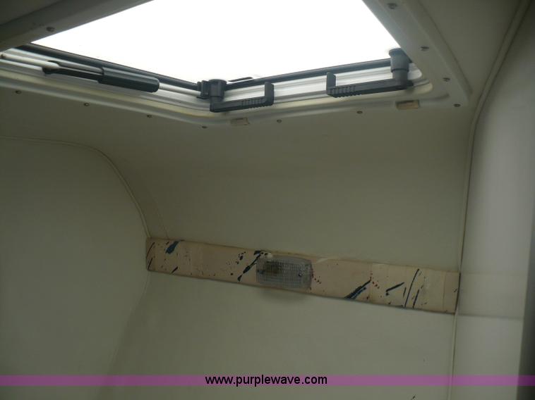 image for item A4851 1995 Baja 320 OS 32' boat and trailer