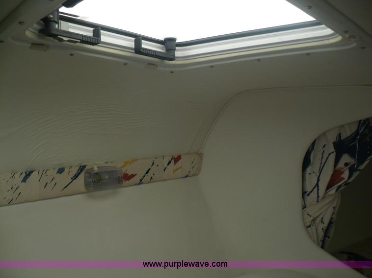 image for item A4851 1995 Baja 320 OS 32' boat and trailer