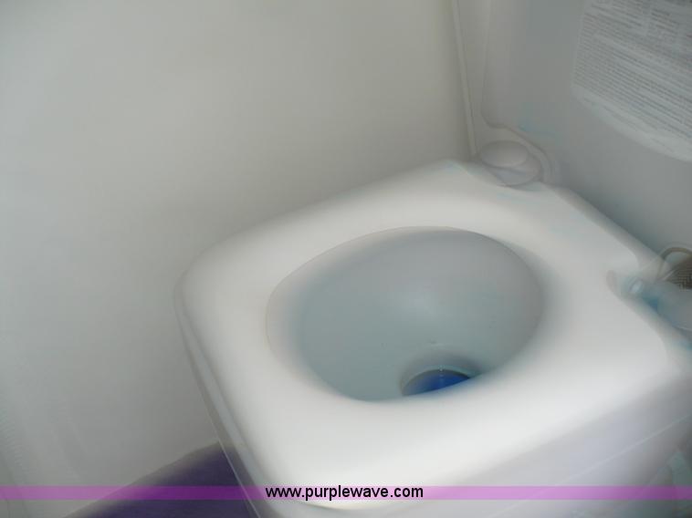 image for item A4851 1995 Baja 320 OS 32' boat and trailer