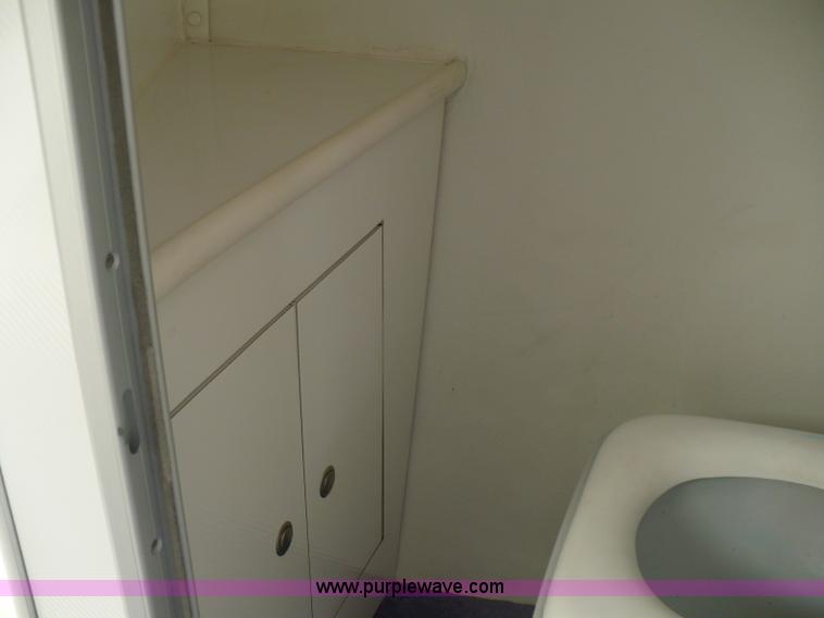 image for item A4851 1995 Baja 320 OS 32' boat and trailer