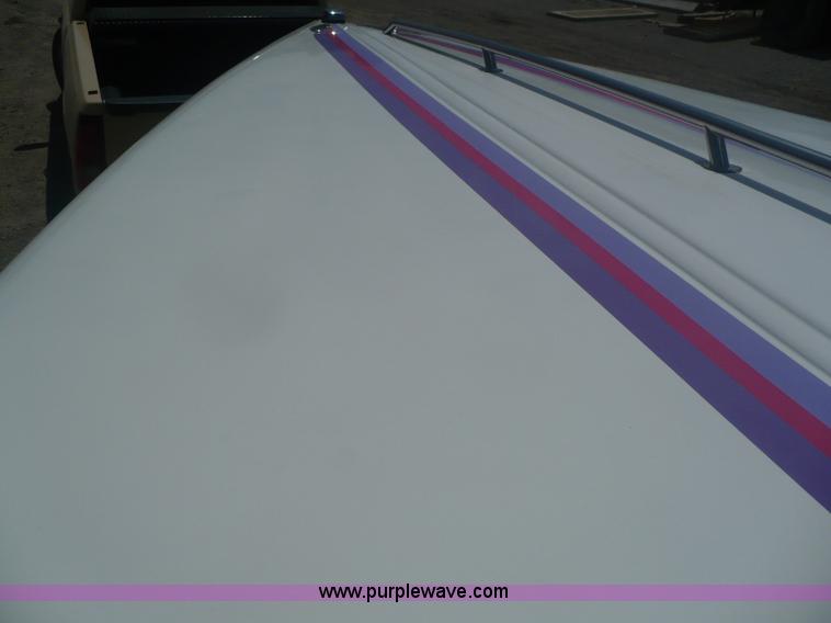 image for item A4851 1995 Baja 320 OS 32' boat and trailer