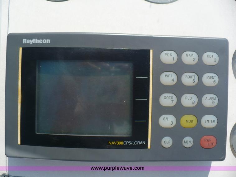 image for item A4851 1995 Baja 320 OS 32' boat and trailer