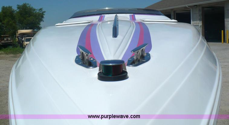 image for item A4851 1995 Baja 320 OS 32' boat and trailer