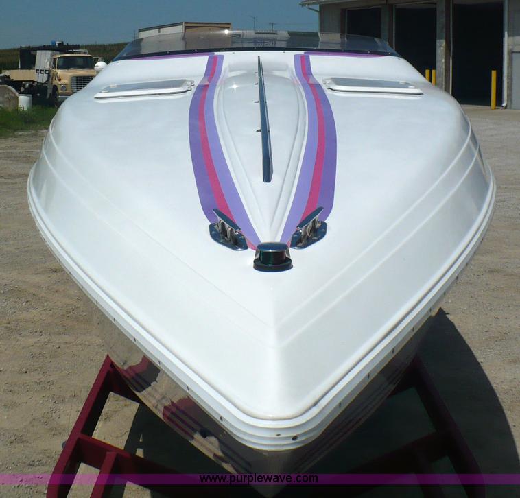 image for item A4851 1995 Baja 320 OS 32' boat and trailer