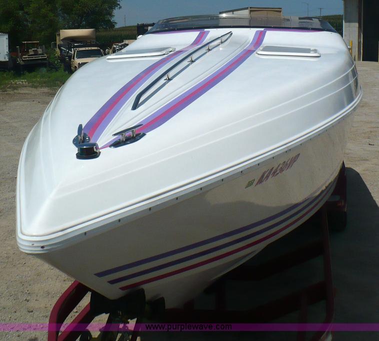 image for item A4851 1995 Baja 320 OS 32' boat and trailer