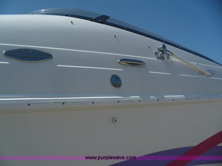 image for item A4851 1995 Baja 320 OS 32' boat and trailer