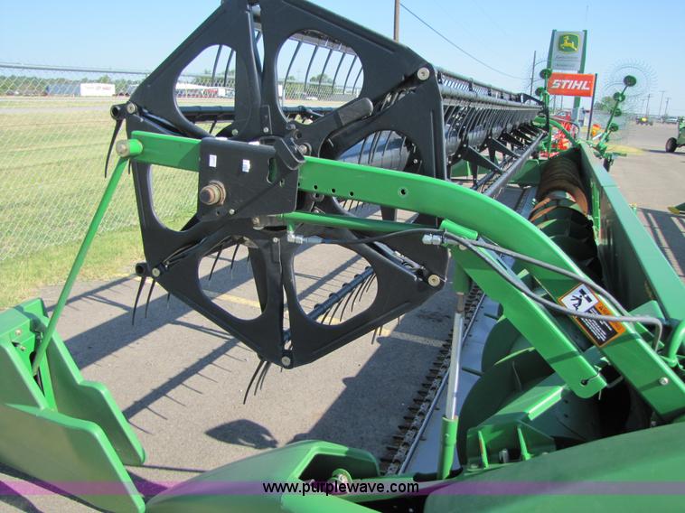 image for item A4676 2009 John Deere 635F flex head