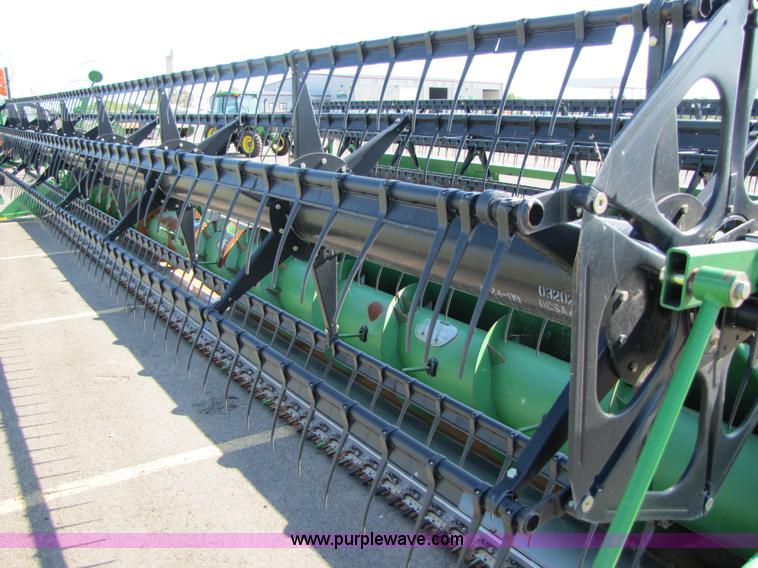image for item A4676 2009 John Deere 635F flex head