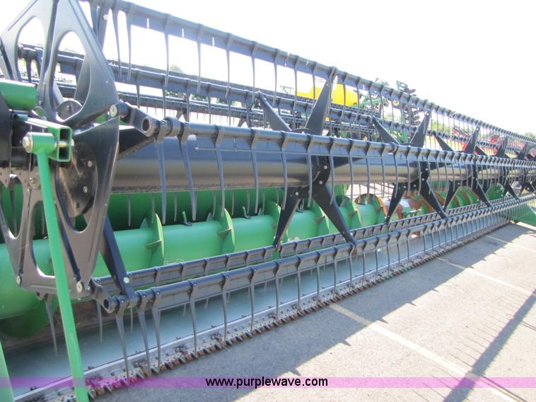 image for item A4676 2009 John Deere 635F flex head