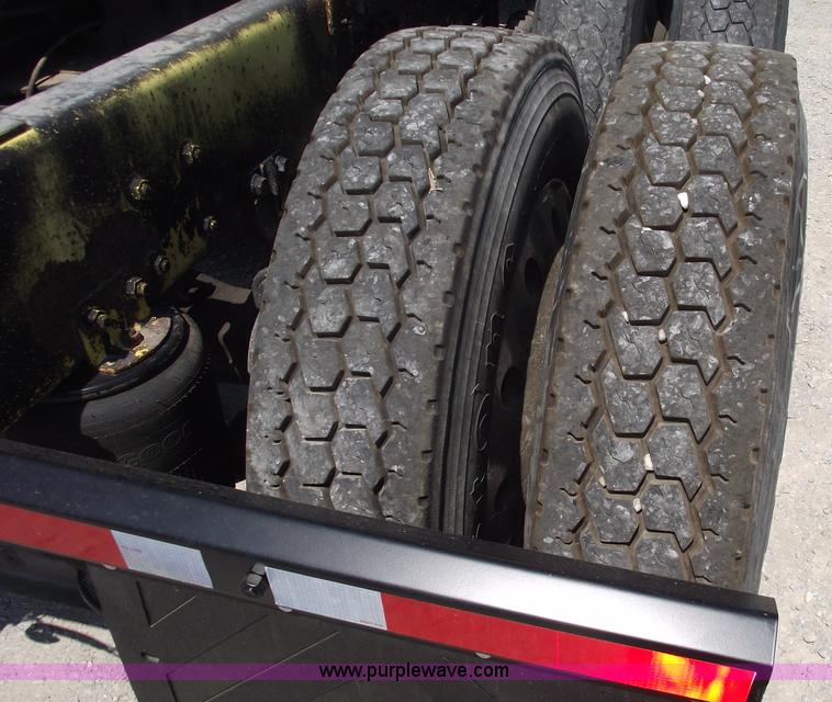 image for item A4111 1993 Volvo Whitegmc WIAM semi truck