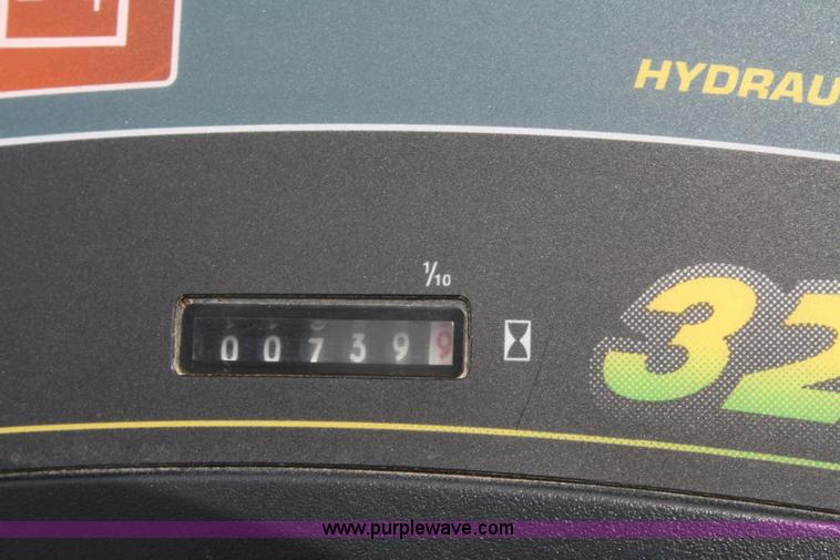 image for item A2206 John Deere 325 lawn mower