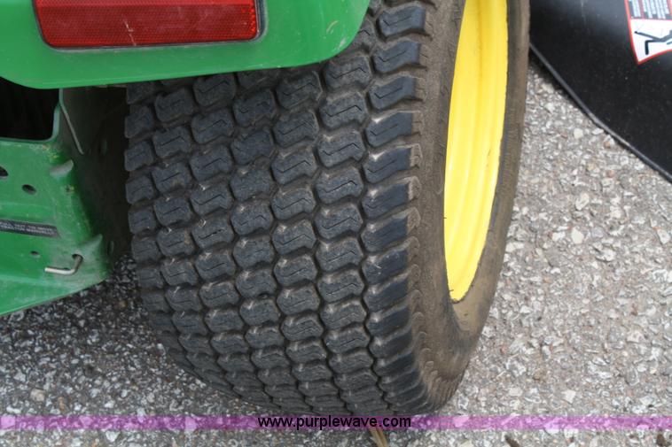 image for item A2206 John Deere 325 lawn mower