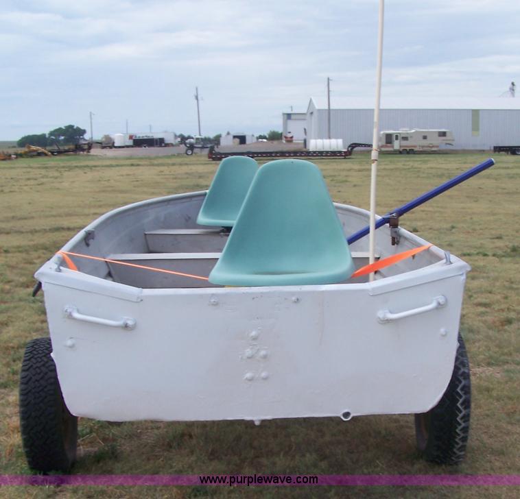 image for item A4512 14' aluminum two-person boat and trailer