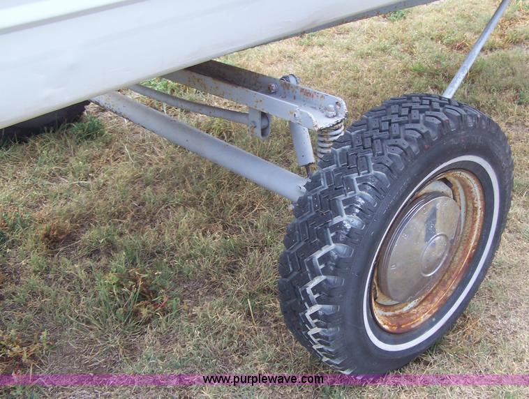 image for item A4512 14' aluminum two-person boat and trailer