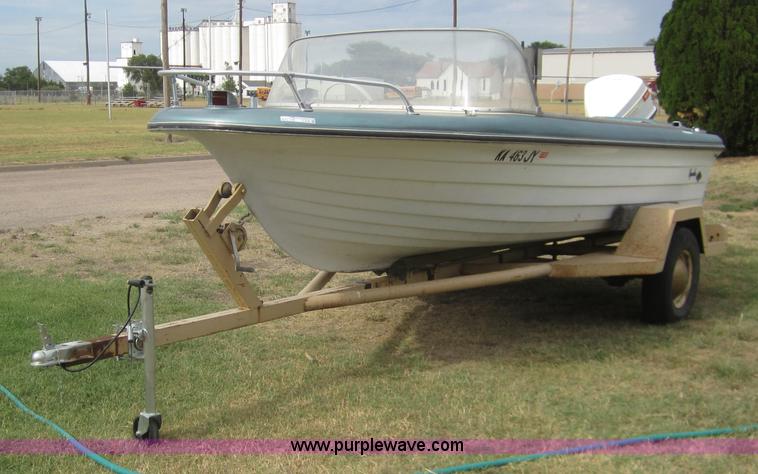 image for item C9766 Apache 16' boat with trailer
