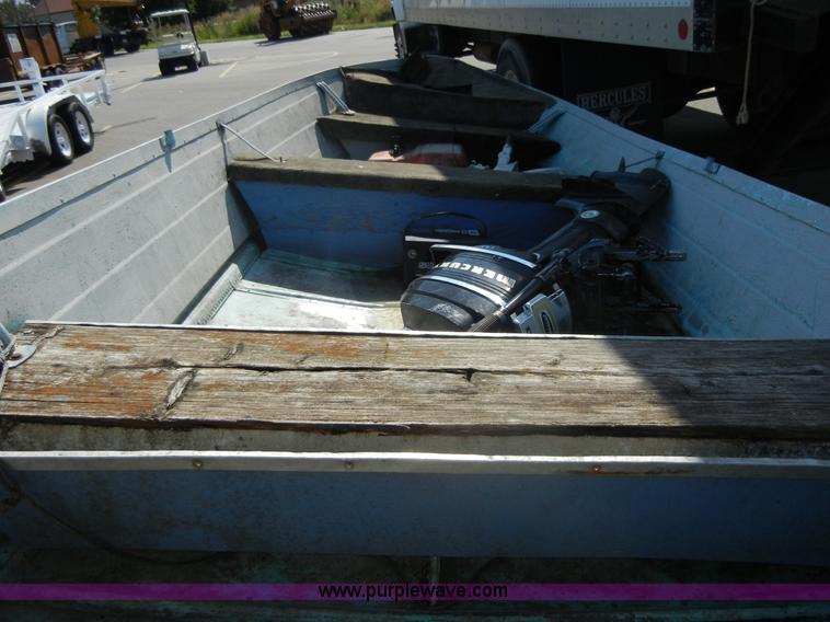 image for item D9642 14' boat with trailer