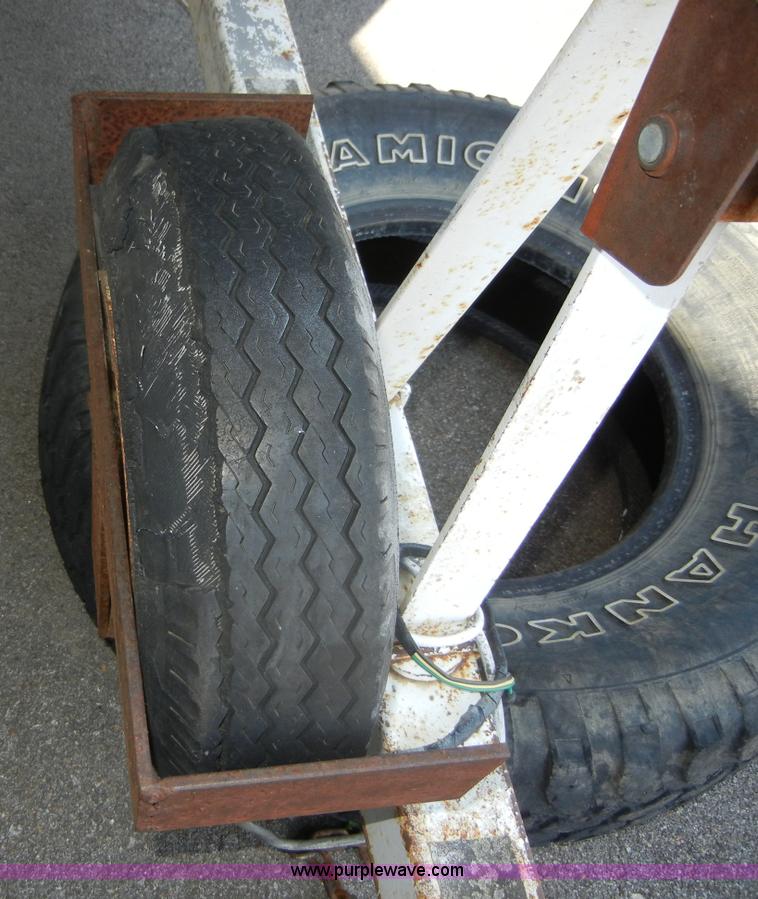 image for item D9642 14' boat with trailer