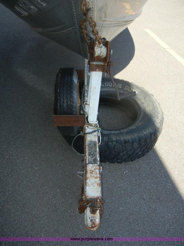 image for item D9642 14' boat with trailer