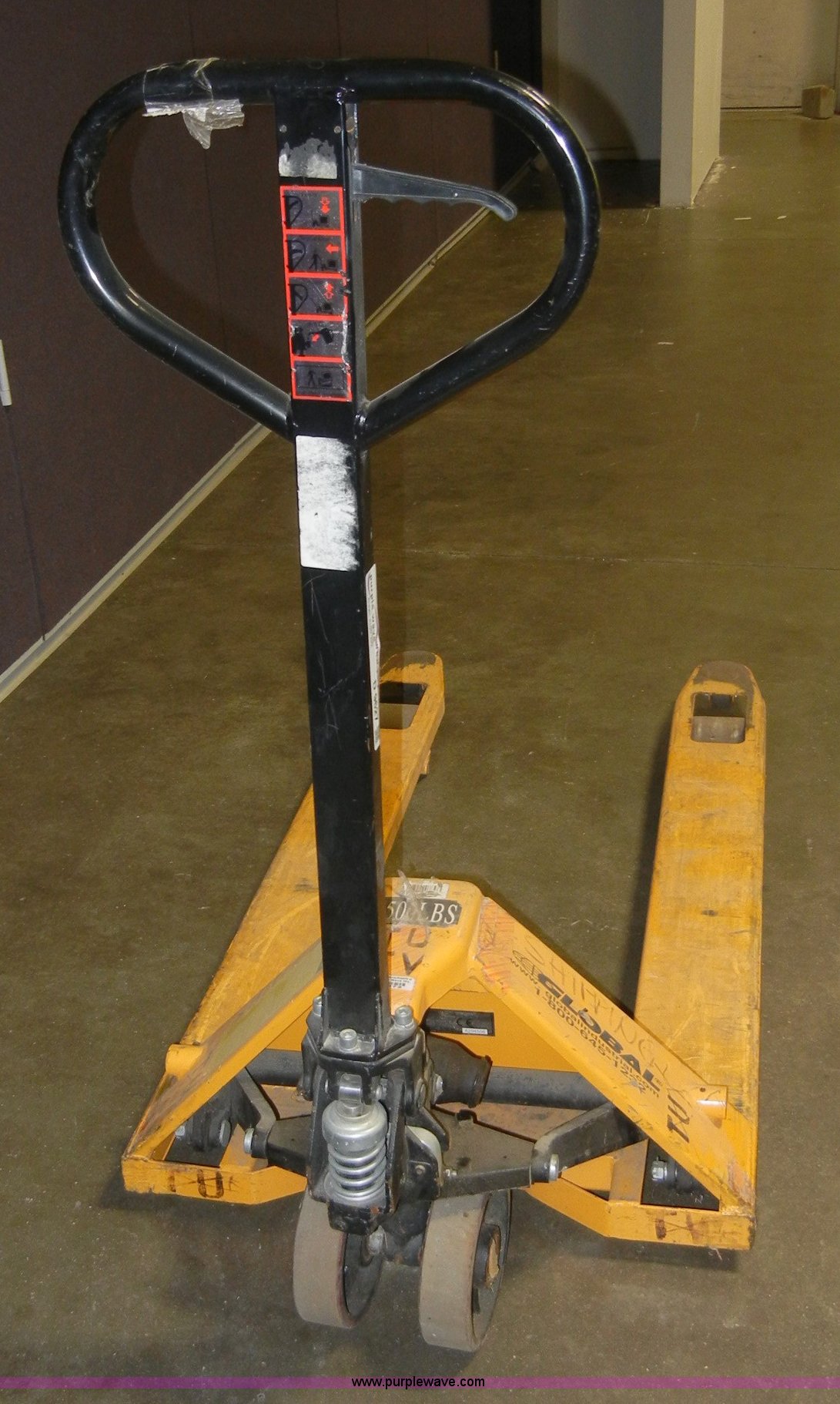 Global pallet jack in Manhattan, KS Item D9627 sold Purple Wave