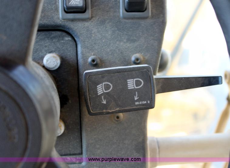 image for item A2580 1995 Caterpillar 140H motor grader