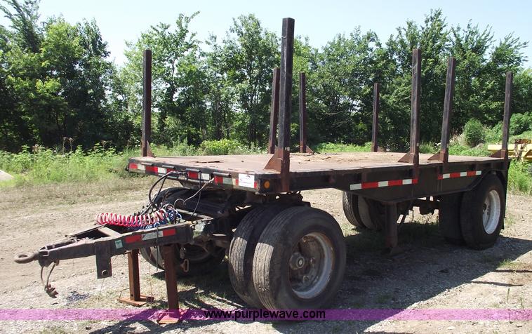 image for item A4141 Shop built 16' x 8' log trailer with dolly