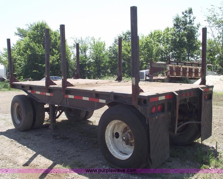 image for item A4141 Shop built 16' x 8' log trailer with dolly