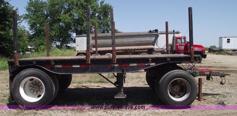 image for item A4141 Shop built 16' x 8' log trailer with dolly