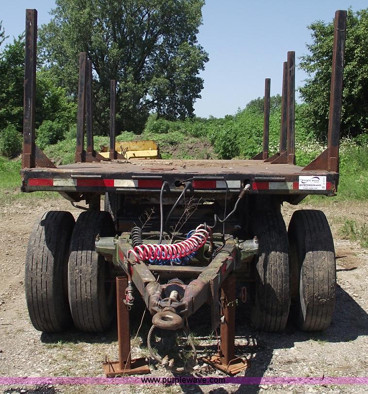 image for item A4141 Shop built 16' x 8' log trailer with dolly