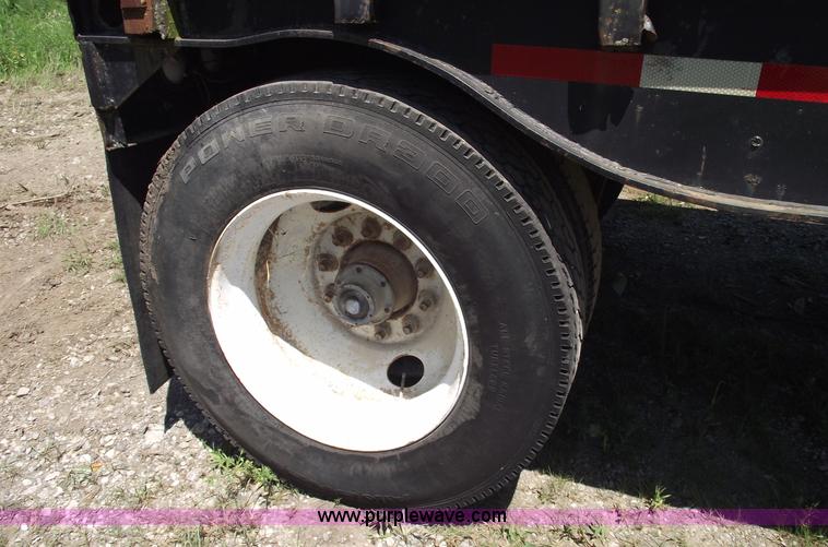 image for item A4141 Shop built 16' x 8' log trailer with dolly