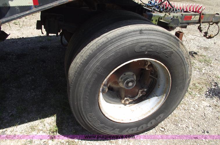 image for item A4141 Shop built 16' x 8' log trailer with dolly