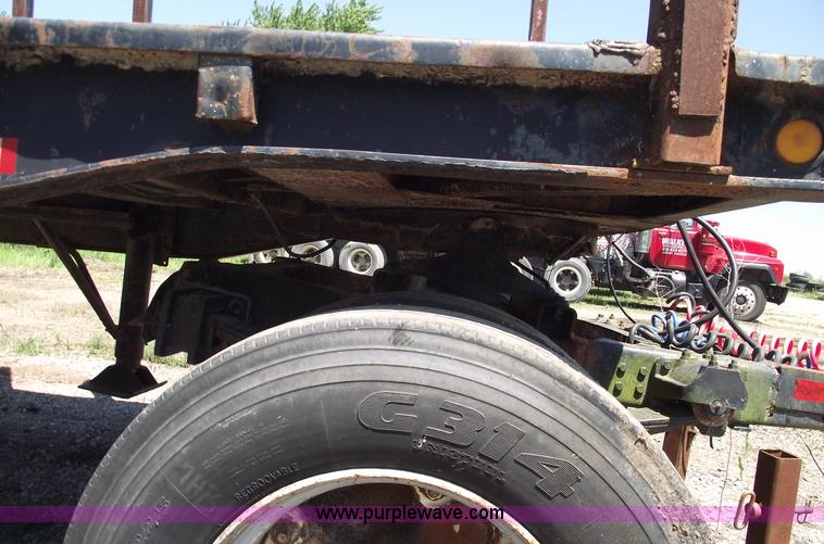 image for item A4141 Shop built 16' x 8' log trailer with dolly