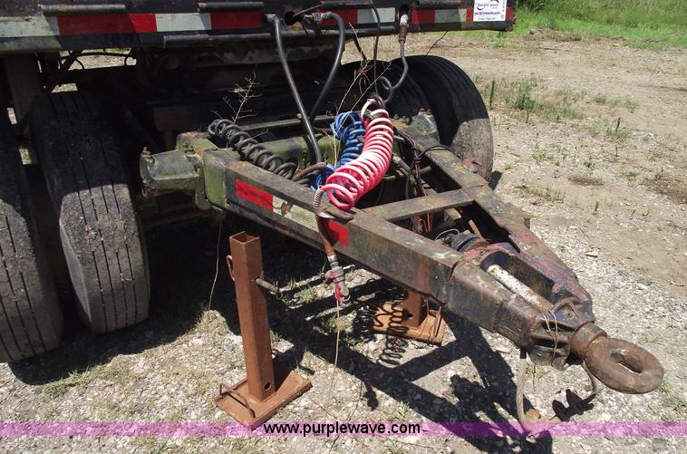 image for item A4141 Shop built 16' x 8' log trailer with dolly