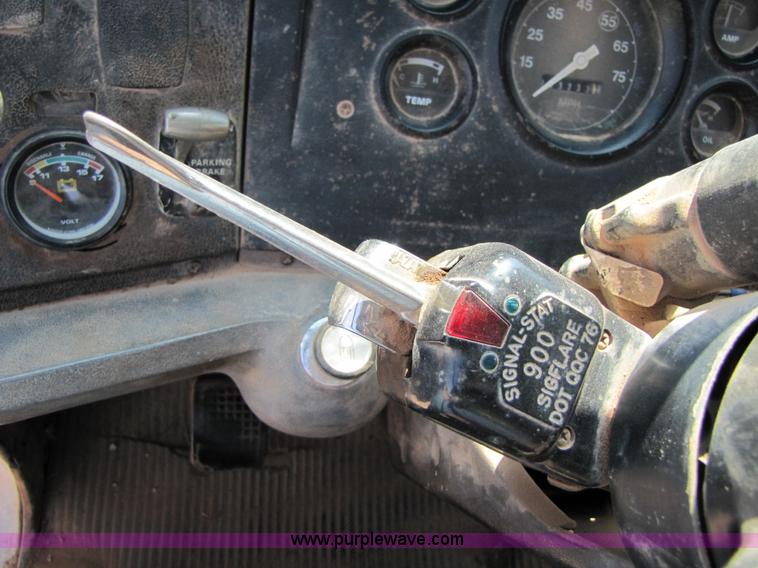 image for item A4672 1984 Ford 8000 winch truck