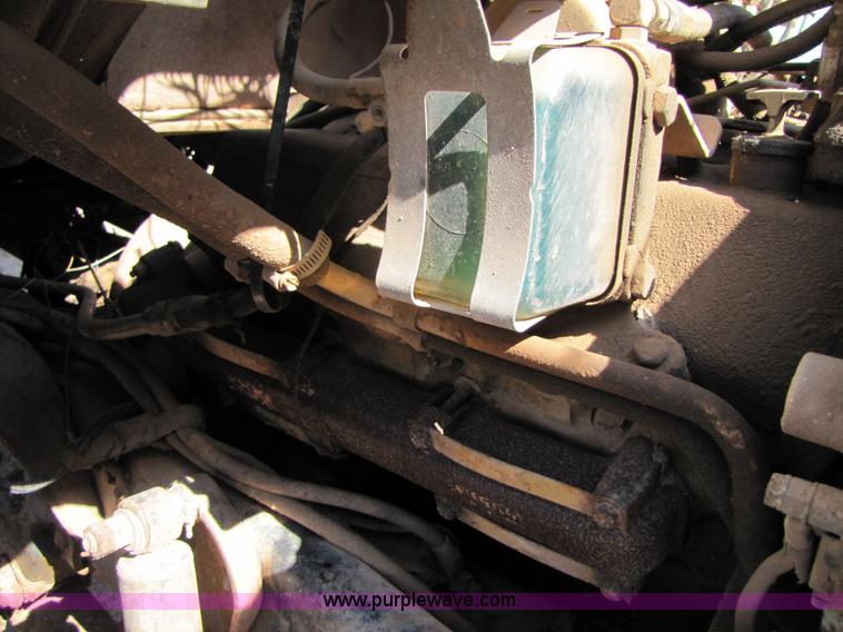 image for item A4672 1984 Ford 8000 winch truck