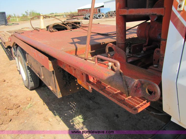 image for item A4672 1984 Ford 8000 winch truck